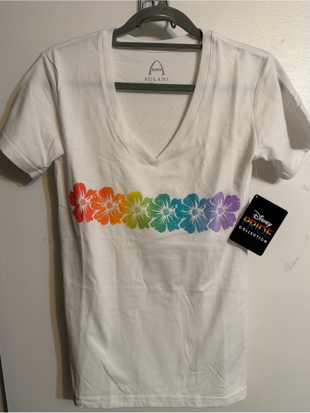 Disney White V‑Neck Tee with Rainbow Hibiscus Floral Row